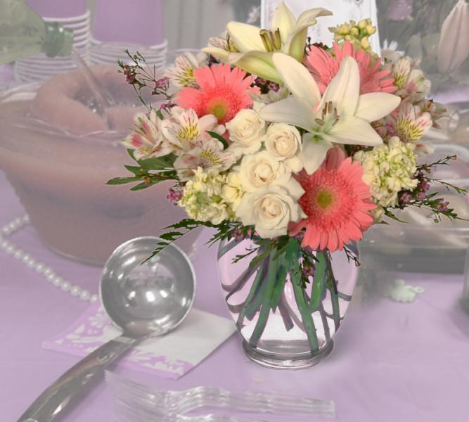 What better way to announce the birth of a new baby girl than with flowers? It's A Girl shower flowers add grace and elegance to your baby shower. 