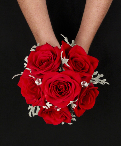 This beautiful red prom bouquet has great crystal accents that really pop against the red flowers.