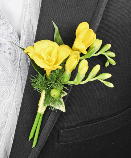 This yellow and green boutonniere features beautiful yellow flowers with hints of green accents. 