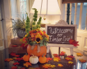 Decorate your entryway with sunflowers, pumpkins, and fall leaves. Looking for other inspiration? Contact us today! 